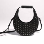 OVER THE MOON, Noir Clouté